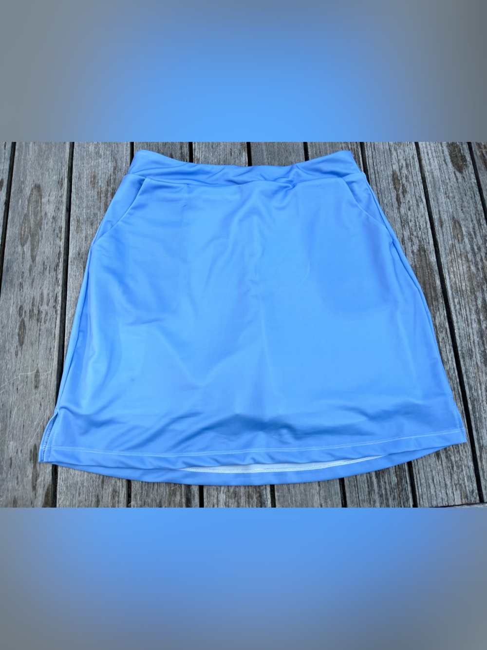 PERIWINKLE BLUE POLYESTTER SKORT. SIZE 6. NEW!